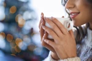woman drinking tea and practicing hygge self care