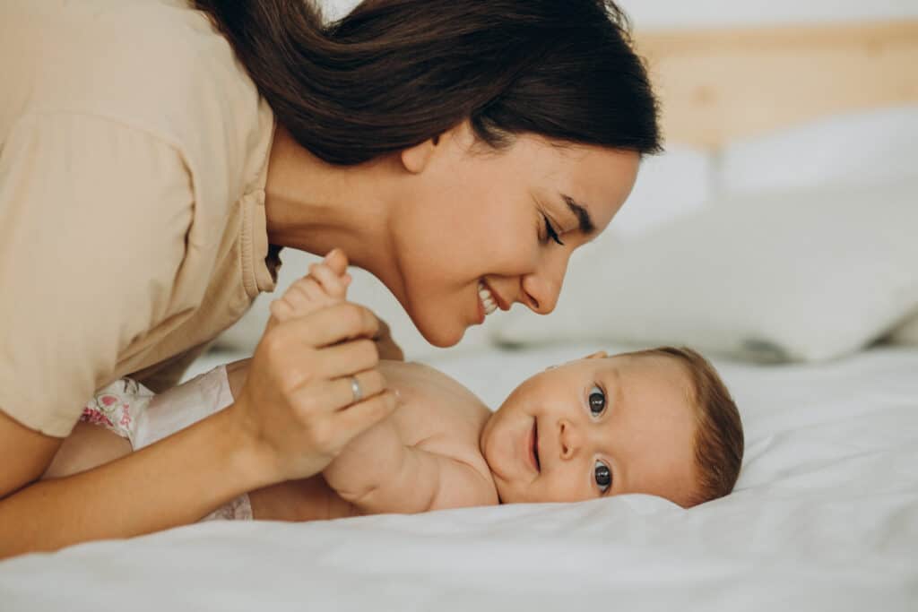 Mom with infant reclaiming her metabolism after pregnancy